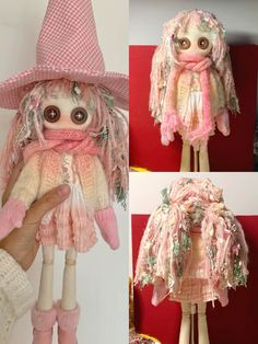 the doll is wearing a pink hat and scarf