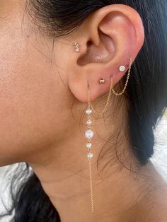 Pearls have been highly prized for all of history - it's said that Krishna plucked the first pearl from the ocean for his daughter to wear on her wedding. These pearls check all the boxes. They're modern, minimalist, classic, but also so beautiful that they'll take your breath away. These earrings are available in two styles - the standard extra long threader, and the double terminated threader. The standard threader has one end totally open and dangling, the other end threading through one or m Threader Earrings Gold, Rough Seas, Diy Jewelry Earrings, Ocean Treasures, Best Friend Necklaces, Lobe Piercing, Peruvian Opal, Friend Necklaces, Threader Earrings