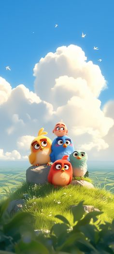 the angry birds are standing on top of a hill with grass and clouds in the background