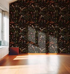 the wallpaper is very colorful and has animals on it, as well as plants