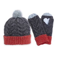 a pair of gray and red knitted mittens with a heart on the top
