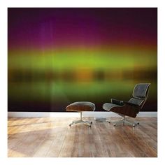 the aurora bore wallpaper mural in an office space with a chair and ottoman,
