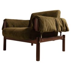 a brown chair with two pillows on top of it's back and armrests