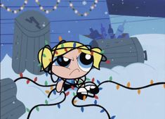 the powerpuff character is wearing headphones and has christmas lights around her neck