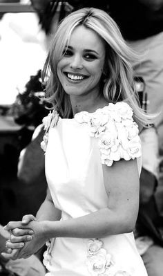 black and white photograph of a woman smiling