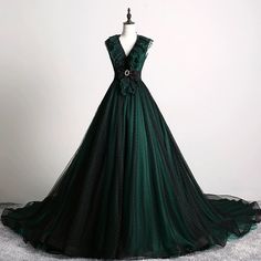 Discover timeless elegance with our Forest Green Ball Gown with Textured Ruffle Accents - Green Evening Dress with Bow Tie Belt Plus Size. This exquisite creation boasts a plunging V-neckline adorned with layered ruffle detailing, infusing classic sophistication with a modern twist. The bodice seamlessly transitions into a full, flowing skirt, layered with delicate polka dot tulle that adds depth and allure to every movement. Accentuating the waist is a stylish bow tie belt, featuring a sleek, decorative buckle that enhances the gown's exquisite craftsmanship. Perfect for exclusive galas or enchanting evening affairs, this gown combines luxurious textures and a dramatic silhouette to ensure you feel as stunning as you look. Designed to flatter every figure, it promises an impeccable fit an Celestial Party, Dark Green Prom Dress, Victorian Style Wedding Dress, Occassion Dress, Green Ball Gown, Prom Dress Ball Gown, Prom Dress Ball, High Low Evening Dresses, Nontraditional Wedding Dress