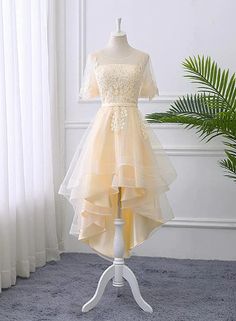 Custom size and custom color are available, there is no extra payment for custom size or custom color. Product Information: Dress Number: #S34R, Material: Tulle, Silhouette: A-line Color: Champagne, Hemline: High Low, Back Details: Lace-up Delivery times: Processing time: 2-3 weeksShipping time: 3-5 working days Rush Order Rush order service is available. For rush order, you can receive your order in 2 weeks. Custom Measurements For custom size, please leave us the following measurements in the Yellow High Low Dress, Dama Champagne Dresses, High Low Homecoming Dresses, Short Fantasy Dress, Pastel Homecoming Dresses, High Low Party Dresses, Prom Dress Short, डिजाइनर कपड़े, Cute Dress Outfits