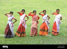 Download this stock image: Assamese girls performing dance and celebrating Bihu festival (new year celebration) Assam ; India NO MR - F3G06E from Alamy's library of millions of high resolution stock photos, illustrations and vectors. Bihu Festival, New Year Celebration, Image Processing, Your Image, Photo Image, High Resolution, Im Not Perfect, Stock Images, Resolution