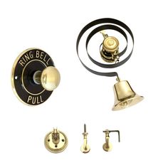 an image of a brass bell and knobs on a white background with clippings