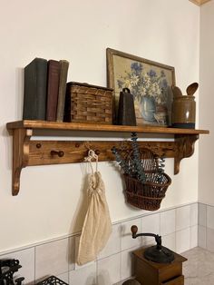 a shelf with books and other items on it