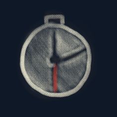 an analog clock with red hands is shown in the middle of the image, and it appears to be dark