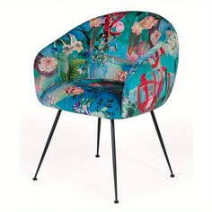 a colorful chair with black legs and flowers on the seat is sitting in front of a white background