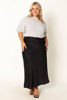 DETAILS
This midi skirt will be your go-to for everyday style. Crafted from a soft satin fabric, it features an elasticised waistband and a pull on design for fuss-free dressing. The black color is a timeless classic that you'll reach for again and again.

midi length
elasticised waist
pull on design
soft satin feel
unlined
material - 97% polyester / 3% spandex









SIZING

model 1 is 5' 7" and wears a Size XS

model 1 stats: bust - 32", waist - 25", hips - 37"
model 2 is 5' 1" and wears a S Black Silk Skirt Outfit, Silk Skirt Outfit, Black Silk Skirt, Cozy Knit Sweater, Satin Midi Skirt, Clothing Details, Cozy Knit, Black Midi Skirt, Satin Skirt