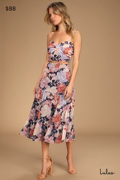 The Lulus Floating Through Flowers Multi Floral Two-Piece Midi Dress is giving us effortless summer beach vibes! Lightweight chiffon, with a vibrant floral pattern and subtle burnout dots, shapes this two-piece set. Adjustable spaghetti straps form a crossover neckline, atop a bodice with keyhole details and side gathers, as well as a smocked panel at the back for fit. The matching skirt has a tiered construction, falling from a banded waist (with elastic at the back) to a midi hem. Fit: This garment fits true to size. Length: Mid-calf length. Size medium Bust: Great for any cup size. Waist: Fitted - very fitted at natural waist. Hip: Not Fitted - fuller skirt allows room for hips. Undergarments: May be worn with a strapless bra, adhesive bra, petals, or no bra. Fabric: Fabric has no stret Cute Summer Outfits For Women Over 40 Casual, Two Piece Midi Skirt Set, Back To School Looks, Engagement Party Outfit, Summer Beach Vibes, Garden Formal, Elegant Summer Dresses, Floral Two Piece, Perfect Closet