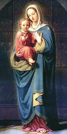 the virgin mary holding a child in her arms