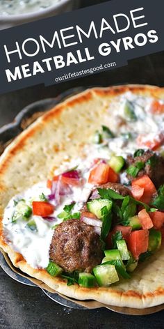 homemade meatball gyros on pita bread with tomatoes and cucumbers