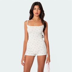 Introducing the Yides Floral Romper in White - the perfect blend of sexy and sweet. This backless romper features a small floral print, adding a romantic and cute touch to your home clothes collection. Perfect for sleepwear, homewear, pajamas, or loungewear. From the LaPose Spring Collection. Yides Floral Romper in White Slim Fit Sexy, Sweet Backless Small Floral Print Romantic, Cute Home Clothes Sleepwear, Homewear, Pajamas, Loungewear LaPose Spring Collection Cute Home Clothes, Small Floral Print, Backless Romper, Home Clothes, Grey Khakis, Fashion Korean, Floral Romper, Clothes Collection, A Romantic