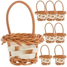 a basket with several different handles and four smaller baskets next to each other on a white background