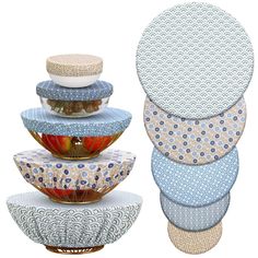 four bowls stacked on top of each other with different patterns and colors in the middle