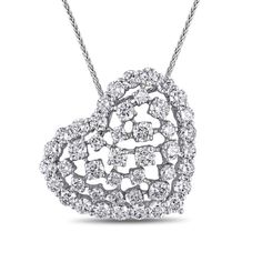 Savor the sweet look of surprise when you present her with this delightful diamond tilted heart pendant. Crafted in 14K white gold, this romantic design showcases a scatter arrangement of multi-sized diamonds - the largest being 1/10 ct. each - wrapped in a diamond-lined heart-shaped border. All diamonds boast a color rank of H and clarity of Si2. Breathtaking with 3 cts. t.w. of diamonds and a bright polished shine, this pendant suspends slightly askew along an 18.0-inch wheat chain that secure Romantic Design, Cluster Necklace, Diamond Heart, White Metal, Diamond Stone, Necklace Designs, Elegant Style, Heart Necklace, Diamond White