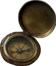 an old brass compass is shown in the open case on a white background with clippings