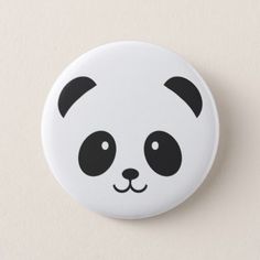 a button with a panda face on it