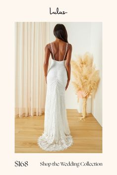 a woman in a white wedding dress looking back