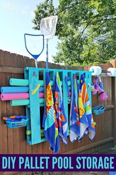 the diy pallet pool storage is easy to make and looks great in any backyard