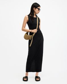 We're throwing it back to the 90s with this simple silhouette. Introducing the Katarina Dress. Crafted from organic cotton with a little bit of stretch to the fabric. The shape never fails - boat neck, sleeveless with detailing at the waist creating a flattering slim fitted look. At maxi length, it's super easy to style with shirts, leather and cardigans on the top (although, it looks just as good by itself - keep it minimal)   This dress is designed to a slim fit Pullover Boat neck Maxi length College Fashion, Back To The 90s, Throwing It Back, Fitted Maxi Dress, Maxi Dress Black, Knitwear Tops, Going Out Outfits, Sweaters And Jeans, Guest Outfit