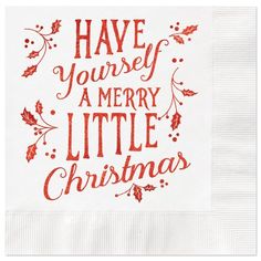 a white napkin with red lettering that says have yourself a merry little christmas