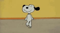 a cartoon dog standing in front of a yellow wall with the words, charlie brown on it