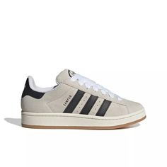 a white and black adidas sneakers on a white background