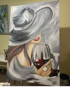 a painting of a woman holding a glass of wine in front of her face and wearing a hat