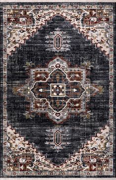 a black rug with an ornate design on the front and back side, in various colors