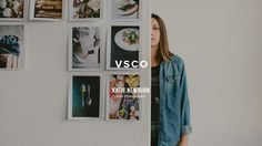 a woman standing in front of a wall with pictures on it and the words vcco above her