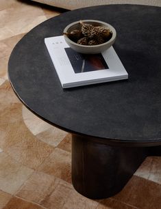 Dynamic textures course through this round metal coffee table. With its raw finish, chunky pedestal base, and drum-style top, Lagos is the perfect coffee table to anchor a modern space with a timeless and sculptural centerpiece. Round Metal Coffee Table, Sleek Coffee Table, Modern Wood Coffee Table, Black Coffee Table, Pedestal Coffee Table, Wicker Coffee Table, Black Coffee Tables, Table Styling, Cool Coffee Tables