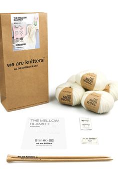 we are knitters kit with knitting needles and yarn balls in front of the package