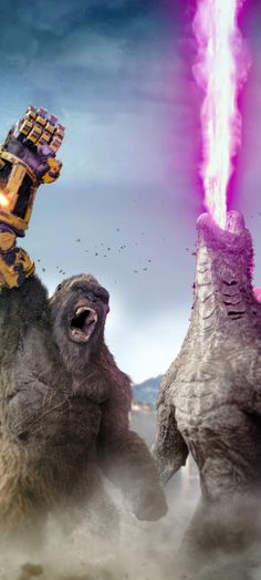 two godzillas fighting with each other in front of a blue sky and purple light