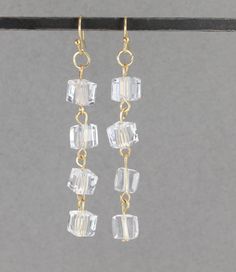 "-lightweight clear bead dangle earrings. -clear plastic square beads -2.5\" long (including ear wire) -each clear bead is 1/4\" wide" Rectangle Beads Jewelry, Earrings With Square Beads, Square Bead Earrings, Dangly Beaded Earrings, Square Beaded Earrings, Square Beads Jewelry Ideas, Diy Tassel Earrings, Bead Chandelier, Diy Earrings Easy