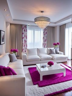 a living room with white couches and purple rugs in front of the windows