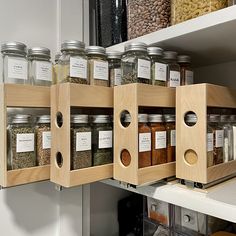 an organized spice rack in a kitchen