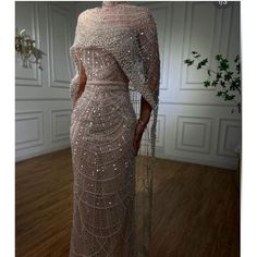 Brand New Nude Train Dress. This Dress Has A Train Silhouette. The Fabric Has A Little Bit Of Stretch. Tags: Floor Length, Size Xs, Size 2, Nude, Jersey, Train Long Cape, Pearl Beading, Dusty Rose Dress, Embellished Gown, فستان سهرة, Engagement Dresses, Dress Dusty, Gowns With Sleeves, Glam Dresses