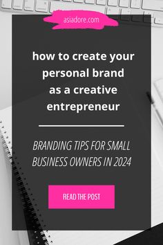 a desk with a keyboard, notebook and pen on it that says how to create your personal brand as a creative enterprise