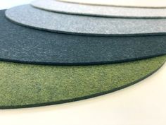 four different colors of felt sitting on top of each other