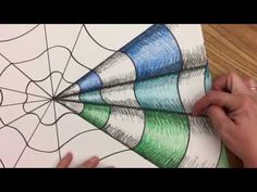 someone is drawing an image with colored pencils