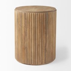 a round wooden stool with vertical slats on the top and bottom, sitting in front of a white background