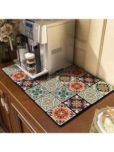 a coffee machine sitting on top of a counter