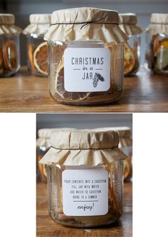 some jars filled with food sitting on top of a wooden table next to each other