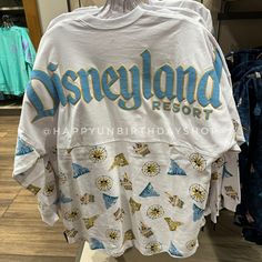 the disneyland resort t - shirt is on display at disney world's merchandise store