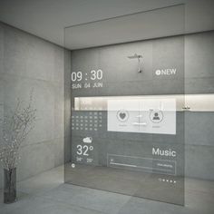 a bathroom with a large glass shower door and the time displayed on it's side